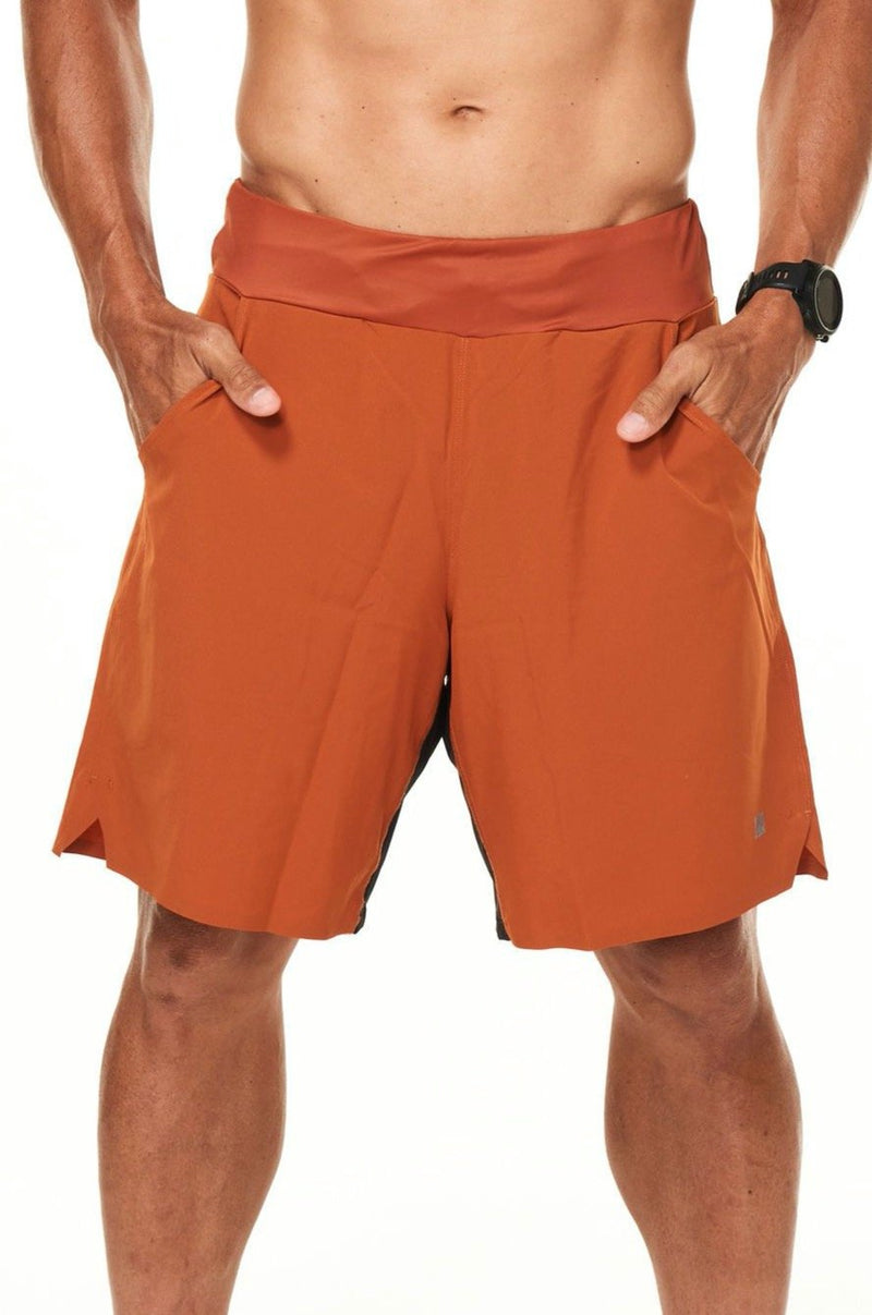 Men's rust Arvo Shorts. Unlined gym shorts with a 9.5" inseam and pockets.