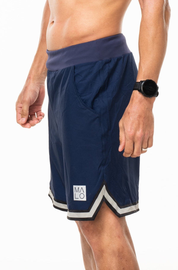 Men's Navy Arvo Shorts. Navy shorts with tan and black outline. Unlined shorts with a 9.5" inseam.